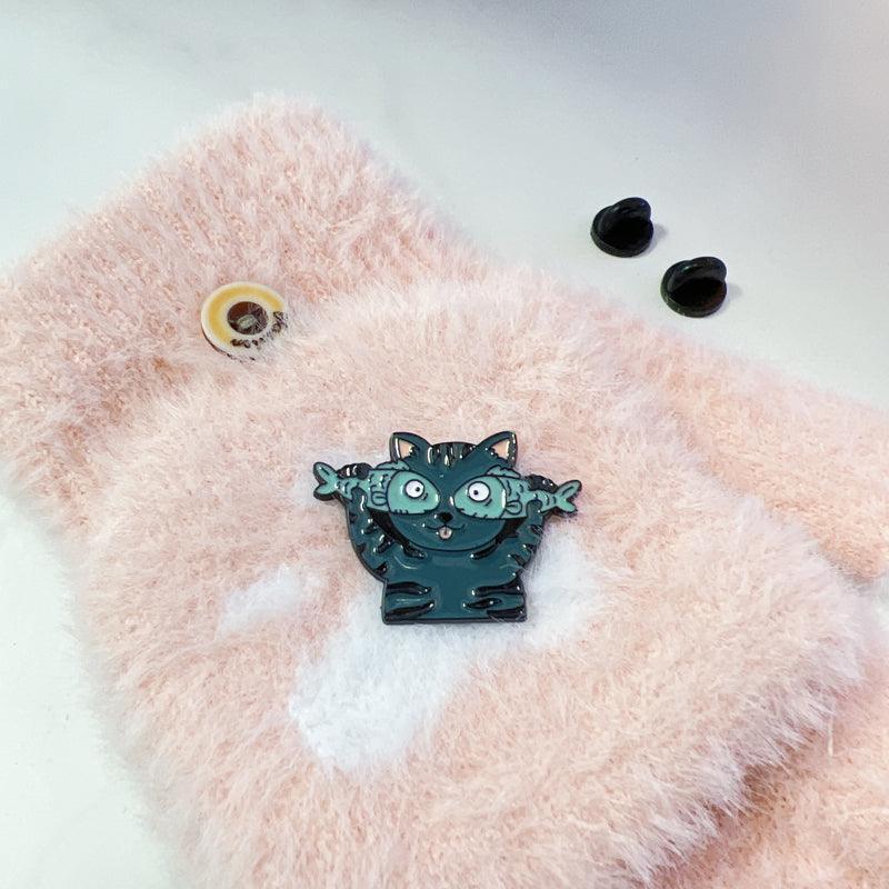 Cat with Fish Enamel Pin – Silly Cat Expression for Fun Outfits