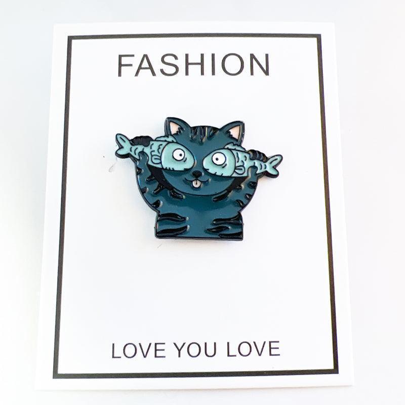 Cat with Fish Enamel Pin – Silly Cat Expression for Fun Outfits